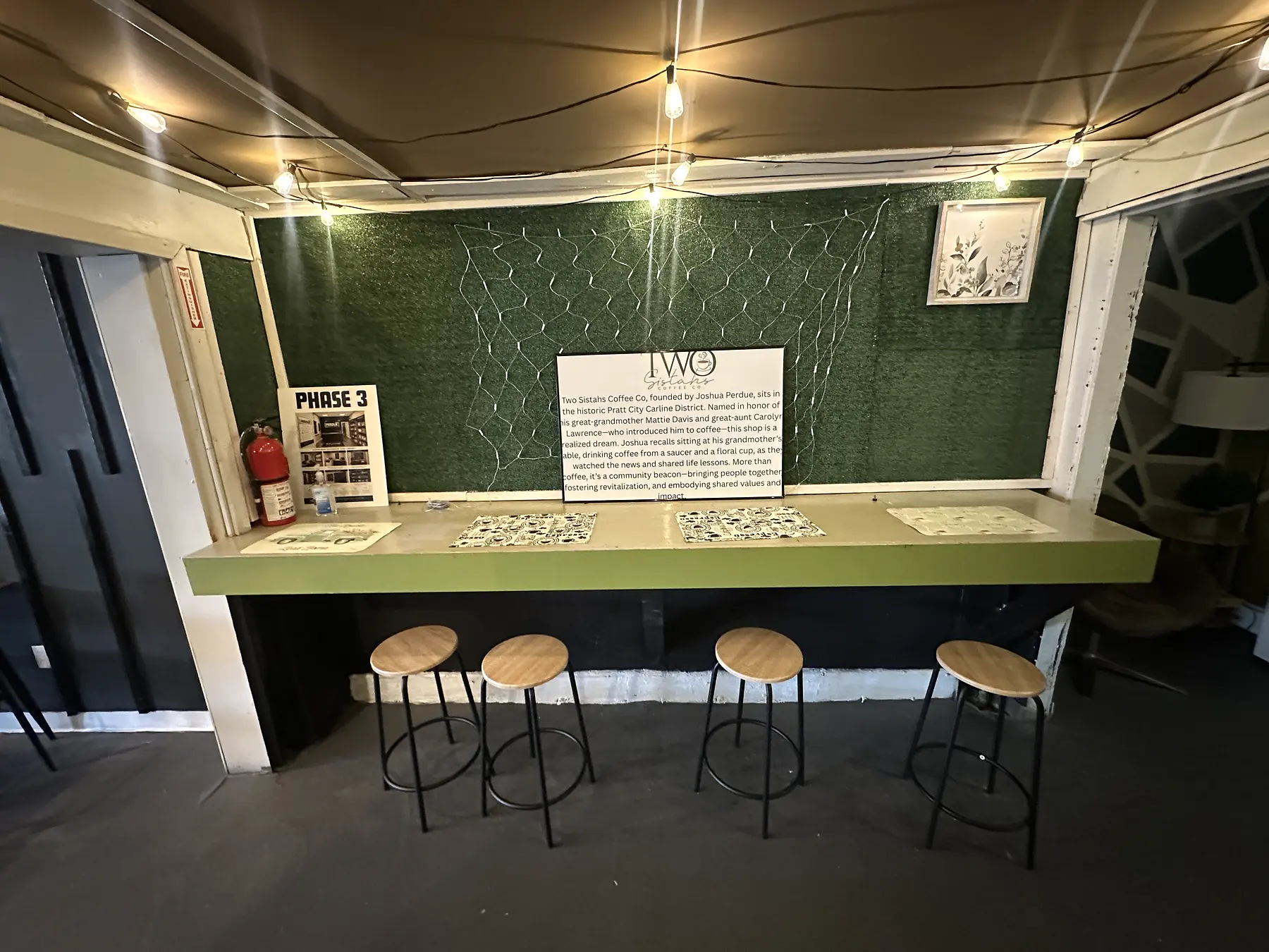Warm counter seating inside Two Sistas